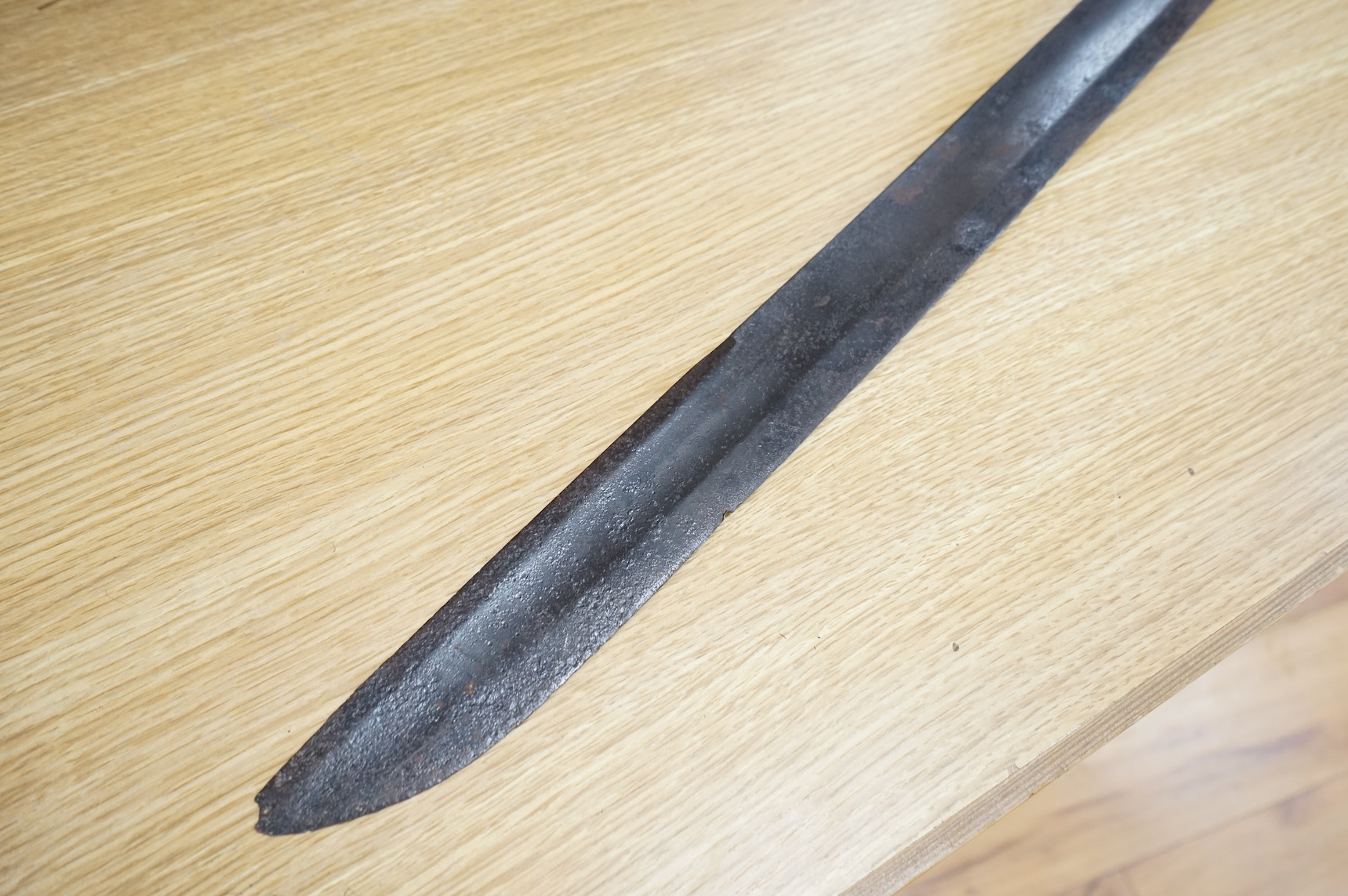 A scarce Germanic Janissary Corps sidearm, produced from 1729-31, broad single edged blade, 65cm, etched in panel with crowned cipher (faint), regulation cast brass hilt with crowned cipher and chevron grip